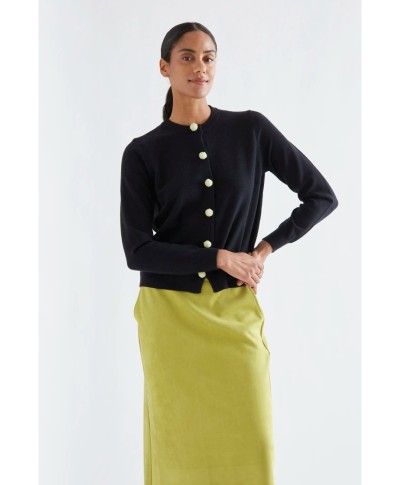 Black cardigan with white pompoms
